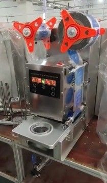400C Тепловой пресс Пластиковая бутылка с водой Автоматический рабочий стол заполнение крышки уплотнения печатная машина