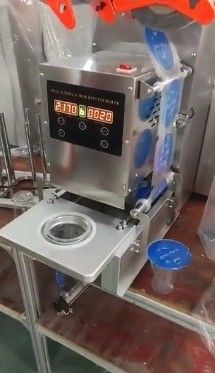 400C Тепловой пресс Пластиковая бутылка с водой Автоматический рабочий стол заполнение крышки уплотнения печатная машина