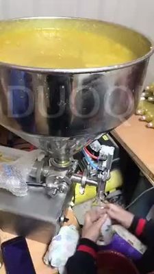 Двухголовый пневматический наполнитель пасты для напитков Косметическая крема Соус Мед 65 кг